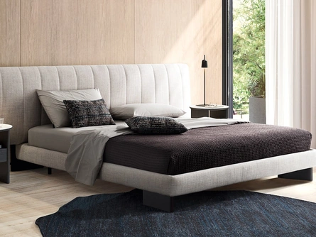 Letto in tessuto imbottito con testiera trapuntata Kilian di Calligaris