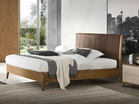 Letto Nirvana in legno con testiera in pelle di Le Fablier
