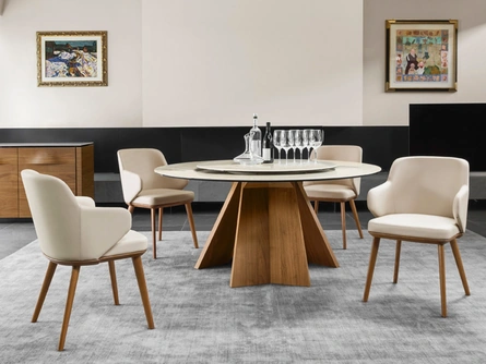 Tavolo rotondo con piano in ceramica e basamento in legno Icaro di Calligaris