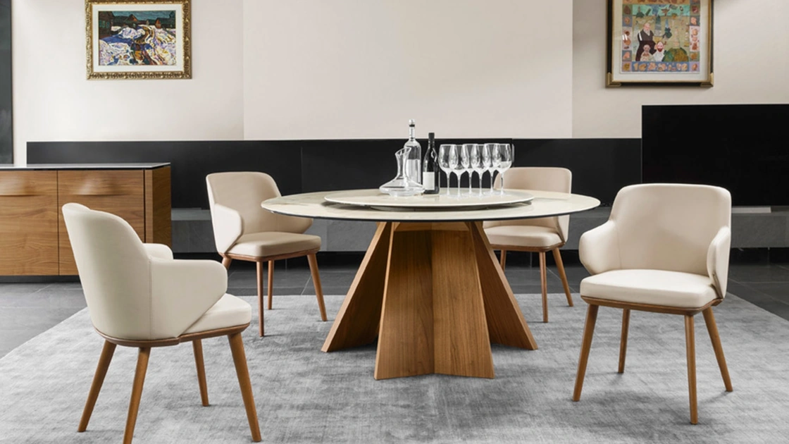 Tavolo rotondo con piano in ceramica e basamento in legno Icaro di Calligaris