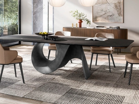 Tavolo di design con piano in ceramica effetto marmo e basamento in cemento Seashell di Calligaris