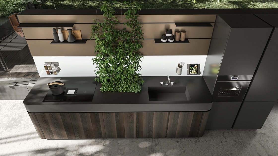 Cucina Design Oasi lineare in Rovere fossile con pianta inserita nel top di Aran